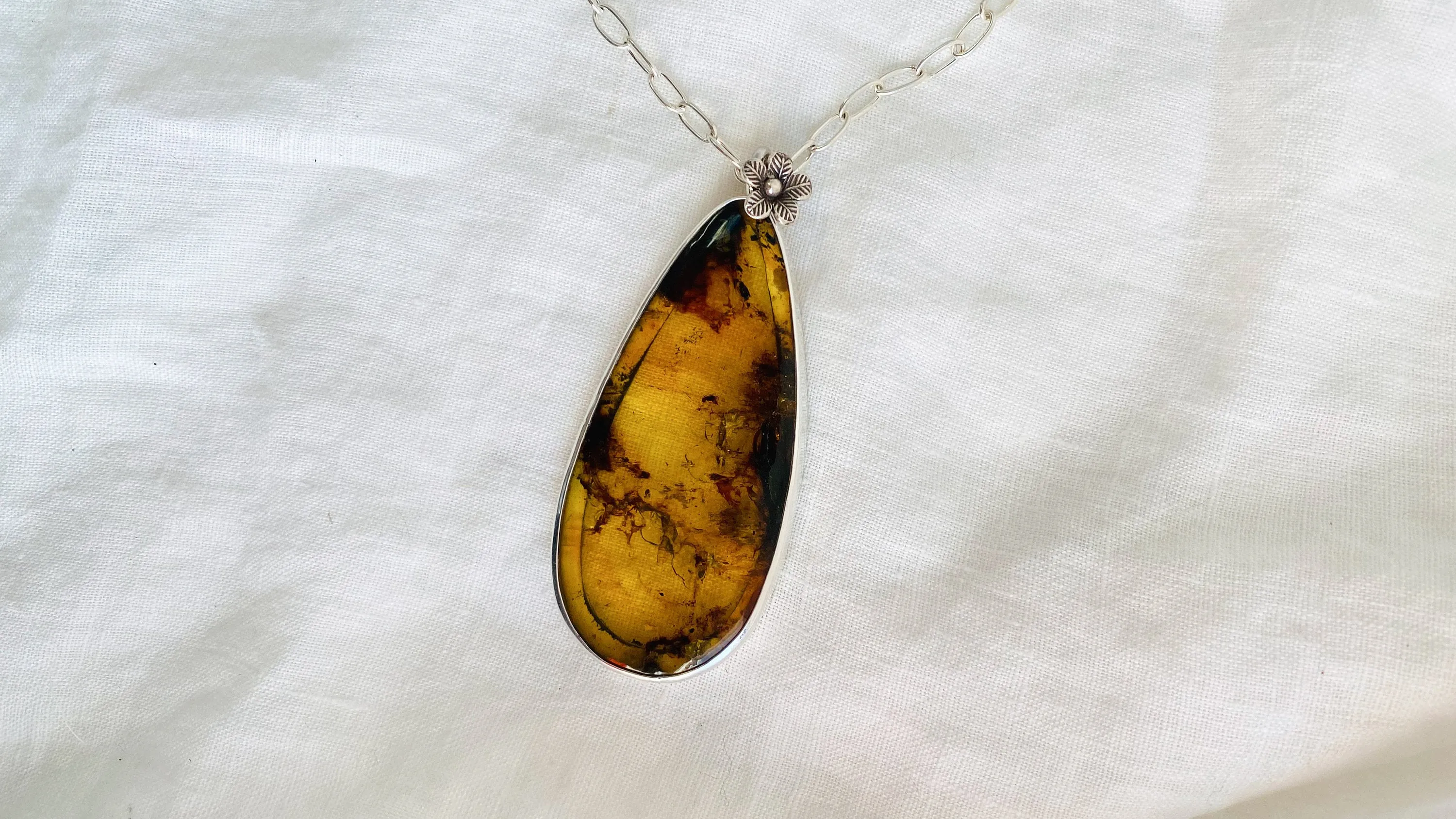 Large Amber Pendant on a Silver Chain. 1211