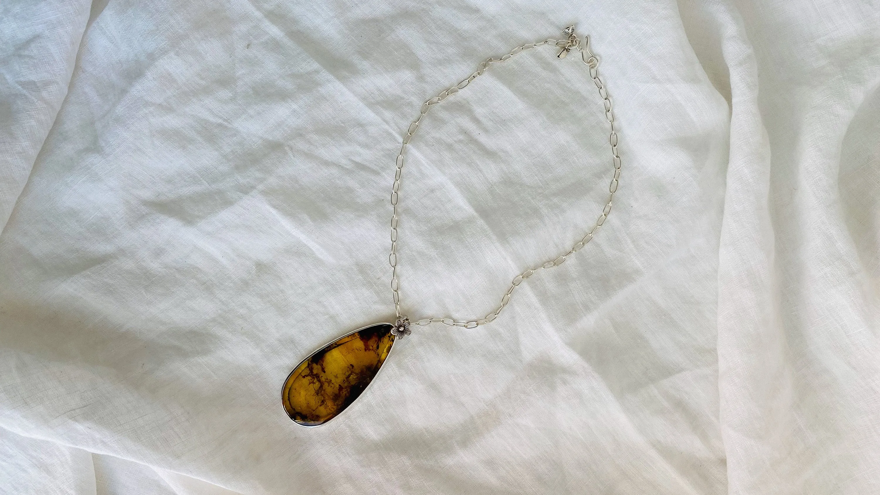 Large Amber Pendant on a Silver Chain. 1211