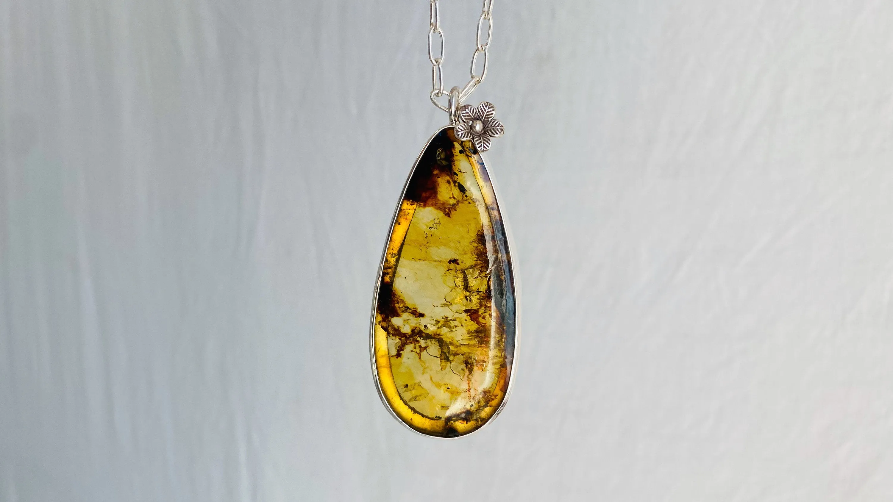 Large Amber Pendant on a Silver Chain. 1211
