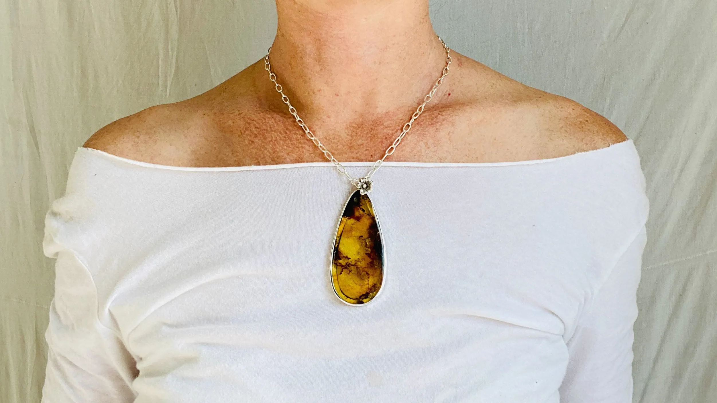 Large Amber Pendant on a Silver Chain. 1211